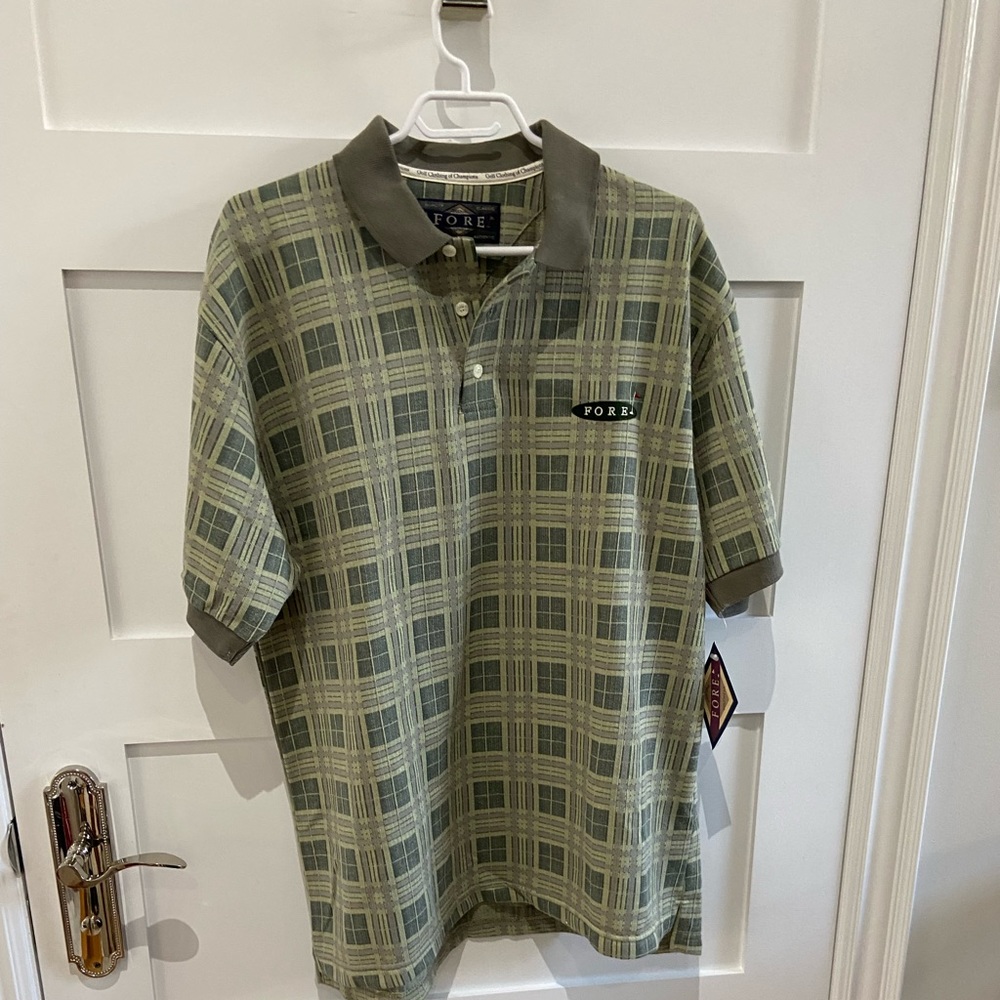 New golf shirt with tag